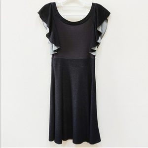 Free People Black flounce ruffle dress size small.  Scoop neck, plunging back FP